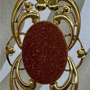 Vintage Goldstone Filigree Scroll Pendant.